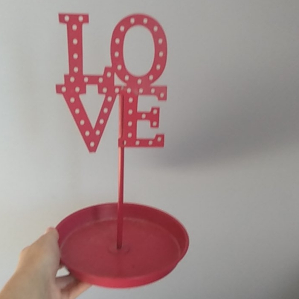 A cute earring and bracelet holder